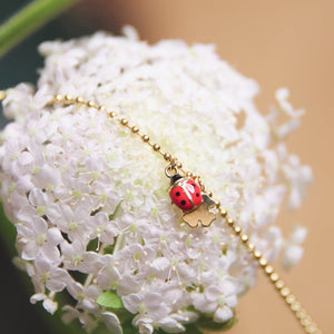 bracelet palline red ladybug gold clover